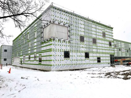 Academy for Global Citizenship building project features the GreenGirt Delta adjustable continuous insulation system.