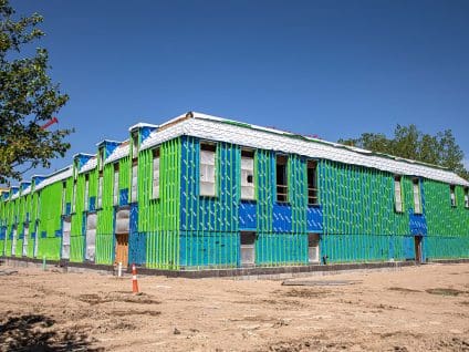 Oakland Community College, corner view of the low-rise building fully installed with GreenGirt Max CMH Z-girts with window openings cut in with GreenGirt XO installed