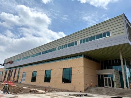 IMG_0188_collin-college-health-sciences-center-greengirt-optima-cmh-smooth-full-elevation-metal-panel-install